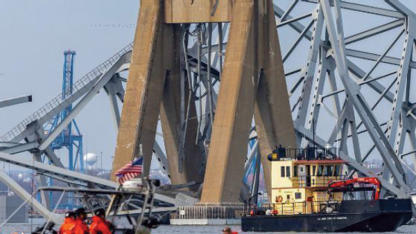 https://www.ajot.com/images/uploads/article/764-baltimore-bridge-clean-up.jpg